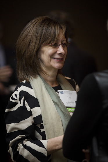 Firm Partner Lisa Savitt greeting attendees at the ABA Section of International Law Fall 2015 Meeting in Montreal.