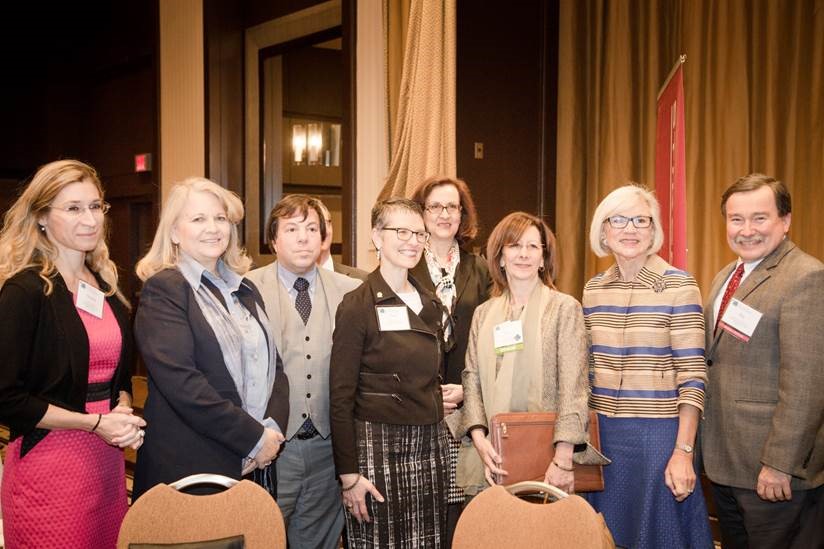 Lisa Savitt posing for a group photo with members of the ABA Section of International Law. To her left is Canadian Bar Association President, Janet Fuhrer, and to her right is Chief Justice of the Canadian Supreme Court, Beverly McLachlin. 